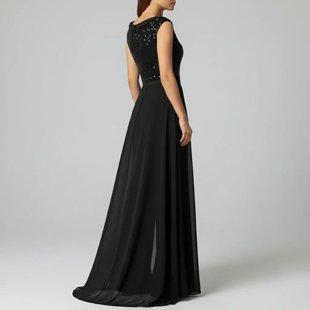 Fallon - Textured Tulle Evening Jumpsuit" can be rewritten as "Fallon - Elegant Textured Tulle Evening Jumpsuit.