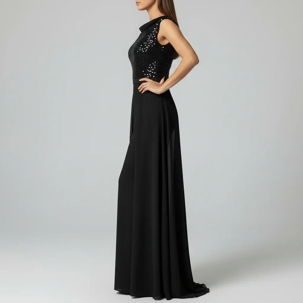 Fallon - Textured Tulle Evening Jumpsuit" can be rewritten as "Fallon - Elegant Textured Tulle Evening Jumpsuit.